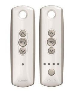 P:ictured are two somfy remote controls. One single channel and one multi channel.